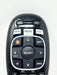 A close-up of a black RC71 television remote control showing the main buttons including ON, OFF, GUIDE, MENU, LIST, SELECT, and directional arrows.