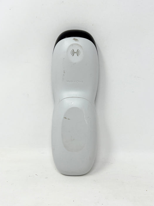 A light gray and black Magic-It! personal care device, photographed from the back against a plain white background.