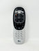A DIRECTV remote control with a black top section and a silver bottom section, featuring various buttons including a numeric keypad, directional pad, and menu buttons.