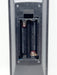 Close-up of a two-battery compartment in a dark gray plastic device, showing the battery terminals, spring contacts, and battery slots against a white background.