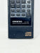 An Onkyo RC-128 remote control transmitter for compact disc digital audio, featuring a black plastic body with a gray button panel and white branding.