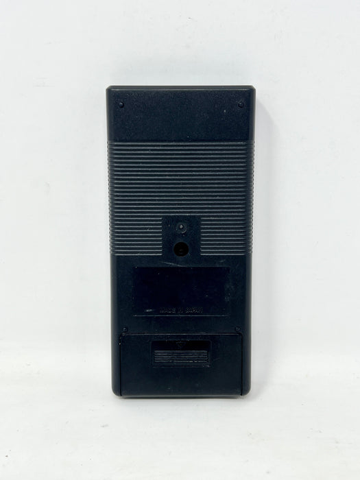 The back of a black plastic electronic device, likely a vintage cassette tape player or similar audio component, shown against a plain white background.