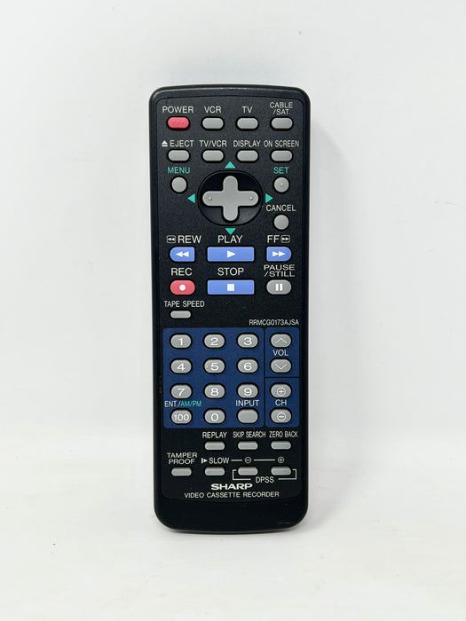 A black Sharp OPSS video cassette recorder remote control with blue, red, and white buttons, photographed against a plain white background.