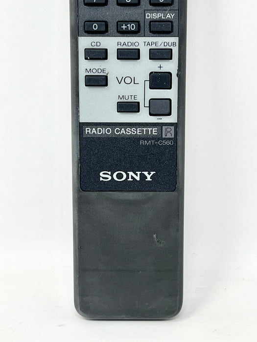 A Sony radio cassette remote control, model RMT-C560, shown vertically against a plain white background.