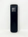 The back of a black plastic remote control with white printed text and a small circular button, shown vertically against a plain white background.