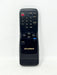 A black Sylvania remote control with gold lettering and blue and red button accents, photographed against a plain white background.